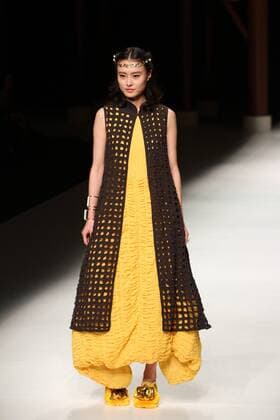 BEIJING, CHINA - OCTOBER 26: (CHINA OUT) A model showcases designs on the runway at Qing s Zheng Qinger Collection during the Mercedes-Benz China Fashion Week Spring Summer 2016 at Beijing Hotel on October 26, 2015 in Beijing, China.  CFP474944509