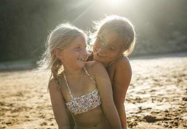 Two sisters having fun together on the beach model released Symbolfoto  MGOF000607