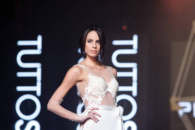 Oct. 26, 2015 - Naples, Italy, Italy - A model wears the bridal gown designed by Pinella Passaro during the Tuttosposi 2015 at Mostra d Oltremare. Naples Italy - ZUMAp133