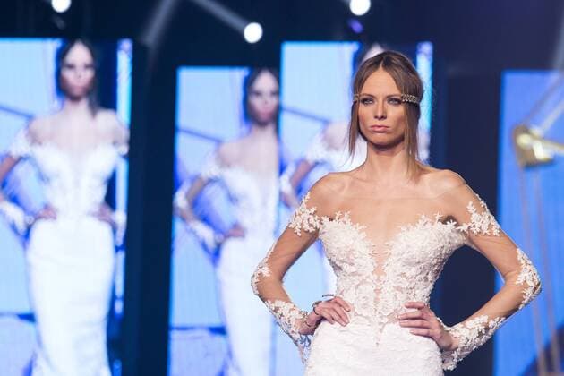 Oct. 26, 2015 - Naples, Italy, Italy - A model wears the bridal gown designed by Pinella Passaro during the Tuttosposi 2015 at Mostra d Oltremare. Naples Italy - ZUMAp133