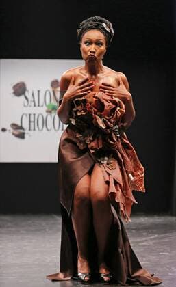 A model wears a creation made with chocolate during a fashion show at the inauguration of the 21st annual Salon du Chocolat in Paris on October 27, 2015. The show, the world s biggest dedicated to chocolate, brings together fashion designers and chocolatiers from around the world.  PAR20151027711 DAVIDxSILPA