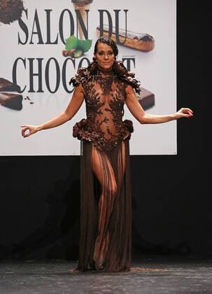 A model wears a creation made with chocolate during a fashion show at the inauguration of the 21st annual Salon du Chocolat in Paris on October 27, 2015. The show, the world s biggest dedicated to chocolate, brings together fashion designers and chocolatiers from around the world.  PAR20151027723 DAVIDxSILPA
