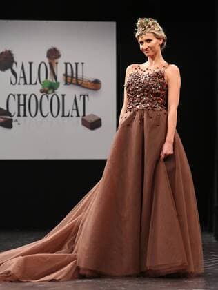 A model wears a creation made with chocolate during a fashion show at the inauguration of the 21st annual Salon du Chocolat in Paris on October 27, 2015. The show, the world s biggest dedicated to chocolate, brings together fashion designers and chocolatiers from around the world.  PAR20151027727 DAVIDxSILPA