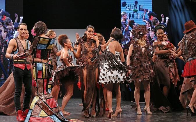 Models wear creations made with chocolate during a fashion show at the inauguration of the 21st annual Salon du Chocolat in Paris on October 27, 2015. The show, the world s biggest dedicated to chocolate, brings together fashion designers and chocolatiers from around the world.  PAR20151027746 DAVIDxSILPA