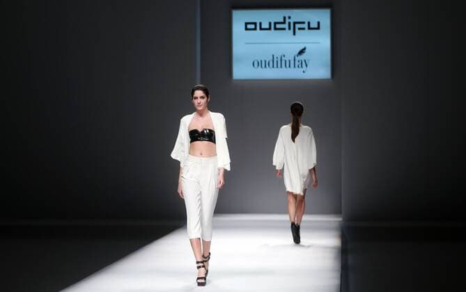 BEIJING, CHINA - OCTOBER 28: (CHINA OUT) Models showcase designs on the runway at OUDIFU & oudifufay Collection during the Mercedes-Benz China Fashion Week Spring Summer 2016 at Beijing Hotel on October 28, 2015 in Beijing, China.  CFP475027355