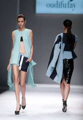 BEIJING, CHINA - OCTOBER 28: (CHINA OUT) Models showcase designs on the runway at OUDIFU & oudifufay Collection during the Mercedes-Benz China Fashion Week Spring Summer 2016 at Beijing Hotel on October 28, 2015 in Beijing, China.  CFP475027362