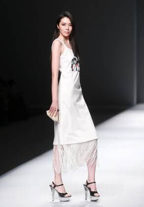 BEIJING, CHINA - OCTOBER 28: (CHINA OUT) A model showcases designs on the runway at OUDIFU & oudifufay Collection during the Mercedes-Benz China Fashion Week Spring Summer 2016 at Beijing Hotel on October 28, 2015 in Beijing, China.  CFP475027363