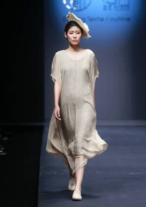 BEIJING, CHINA - OCTOBER 28: (CHINA OUT) A model showcases designs on the runway at DEFANG TEXTILE OUTLINE Collection during the Mercedes-Benz China Fashion Week Spring Summer 2016 at 751D.PARK on October 28, 2015 in Beijing, China.  CFP475028352