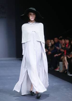 BEIJING, CHINA - OCTOBER 28: (CHINA OUT) A model showcases designs on the runway at DEFANG TEXTILE OUTLINE Collection during the Mercedes-Benz China Fashion Week Spring Summer 2016 at 751D.PARK on October 28, 2015 in Beijing, China.  CFP475028355