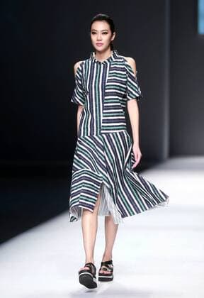BEIJING, CHINA - OCTOBER 28: (CHINA OUT) A model showcases designs on the runway at OUDIFU & oudifufay Collection during the Mercedes-Benz China Fashion Week Spring Summer 2016 at Beijing Hotel on October 28, 2015 in Beijing, China.  CFP475027352