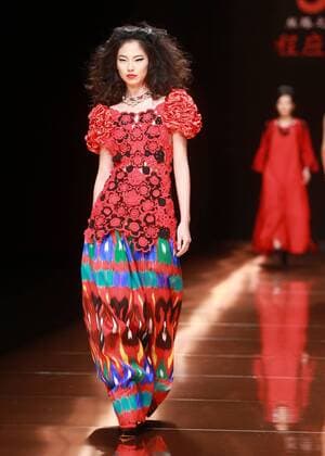 BEIJING, CHINA - OCTOBER 28: (CHINA OUT) A model showcases designs on the runway at Silk Road Star Cheng Yingfen Collection during the Mercedes-Benz China Fashion Week Spring Summer 2016 at Beijing Hotel on October 28, 2015 in Beijing, China.  CFP475064593