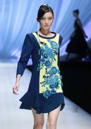 BEIJING, CHINA - OCTOBER 29: (CHINA OUT) A model showcases designs on the runway at TORAY Liu Wei Collection during the Mercedes-Benz China Fashion Week Spring Summer 2016 at 751DÂ·PARK on October 29, 2015 in Beijing, China.  CFP475107371