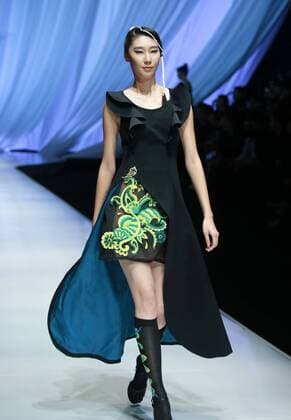 BEIJING, CHINA - OCTOBER 29: (CHINA OUT) A model showcases designs on the runway at TORAY Liu Wei Collection during the Mercedes-Benz China Fashion Week Spring Summer 2016 at 751DÂ·PARK on October 29, 2015 in Beijing, China.  CFP475107375