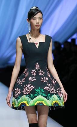 BEIJING, CHINA - OCTOBER 29: (CHINA OUT) A model showcases designs on the runway at TORAY Liu Wei Collection during the Mercedes-Benz China Fashion Week Spring Summer 2016 at 751DÂ·PARK on October 29, 2015 in Beijing, China.  CFP475107377