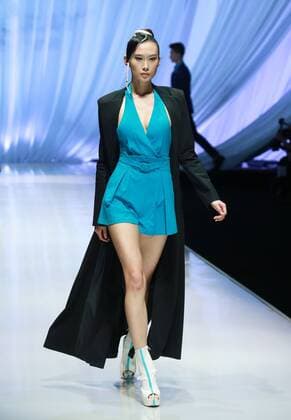BEIJING, CHINA - OCTOBER 29: (CHINA OUT) A model showcases designs on the runway at TORAY Liu Wei Collection during the Mercedes-Benz China Fashion Week Spring Summer 2016 at 751DÂ·PARK on October 29, 2015 in Beijing, China.  CFP475107379