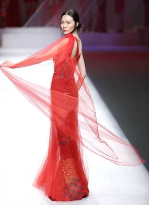 BEIJING, CHINA - OCTOBER 29: (CHINA OUT) A model showcases designs on the runway at GaryWat Qu Tingnan Collection during the Mercedes-Benz China Fashion Week Spring Summer 2016 at Beijing Hotel on October 29, 2015 in Beijing, China.  CFP475107410