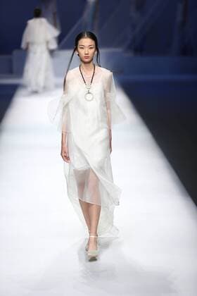 BEIJING, CHINA - OCTOBER 29: (CHINA OUT) A model showcases designs on the runway at GaryWat Qu Tingnan Collection during the Mercedes-Benz China Fashion Week Spring Summer 2016 at Beijing Hotel on October 29, 2015 in Beijing, China.  CFP475107430