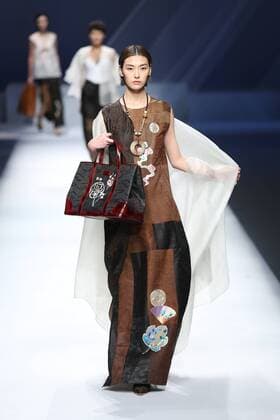 BEIJING, CHINA - OCTOBER 29: (CHINA OUT) A model showcases designs on the runway at GaryWat Qu Tingnan Collection during the Mercedes-Benz China Fashion Week Spring Summer 2016 at Beijing Hotel on October 29, 2015 in Beijing, China.  CFP475107440