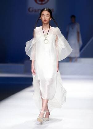 BEIJING, CHINA - OCTOBER 29: (CHINA OUT) A model showcases designs on the runway at GaryWat Qu Tingnan Collection during the Mercedes-Benz China Fashion Week Spring Summer 2016 at Beijing Hotel on October 29, 2015 in Beijing, China.  CFP475107447