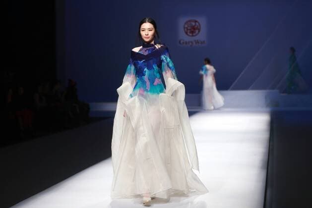 BEIJING, CHINA - OCTOBER 29: (CHINA OUT) A model showcases designs on the runway at GaryWat Qu Tingnan Collection during the Mercedes-Benz China Fashion Week Spring Summer 2016 at Beijing Hotel on October 29, 2015 in Beijing, China.  CFP475107451