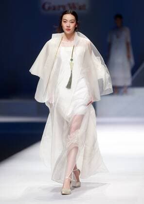 BEIJING, CHINA - OCTOBER 29: (CHINA OUT) A model showcases designs on the runway at GaryWat Qu Tingnan Collection during the Mercedes-Benz China Fashion Week Spring Summer 2016 at Beijing Hotel on October 29, 2015 in Beijing, China.  CFP475107454