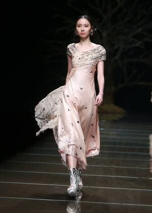 BEIJING, CHINA - OCTOBER 29: (CHINA OUT) A model showcases designs on the runway at 95 Secret Deng Zhaoping Collection during the Mercedes-Benz China Fashion Week Spring Summer 2016 at Beijing Hotel on October 29, 2015 in Beijing, China.  CFP475107096
