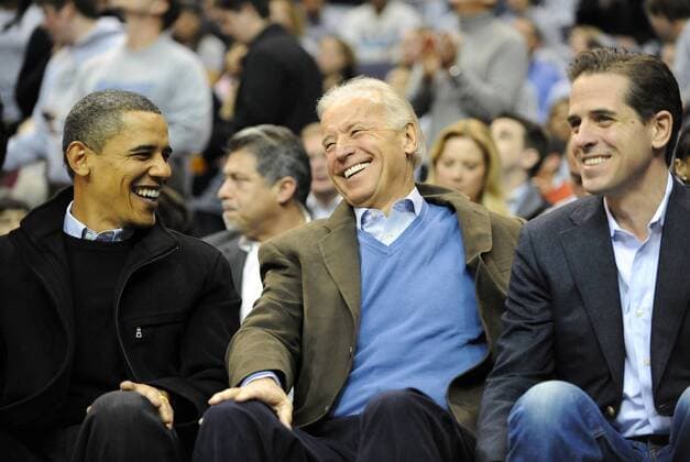 Oct 17, 2014 - Washington, District of Columbia, U.S. - Vice President Joe Biden s son Hunter Biden was discharged from the Navy in February after testing positive for cocaine. PICTURED: Jan. 30, 2010 - President BARACK OBAMA, left, Vice President JOE BIDEN, center, and HUNTER BIDEN share a laugh during the first half of the NCAA basketball game between Georgetown and Duke at the Verizon Center. Georgetown defeated Duke, 89-77.  - ZUMAKE-