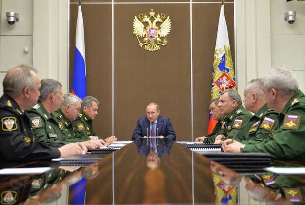 SOCHI, RUSSIA. NOVEMBER 10, 2015. Russia s President Vladimir Putin (C) holds a meeting on Russia s military-industrial complex at Bocharov Ruchei residence. Alexei Druzhinin Russian Presidential Press and Information Office TASS  TS011998
