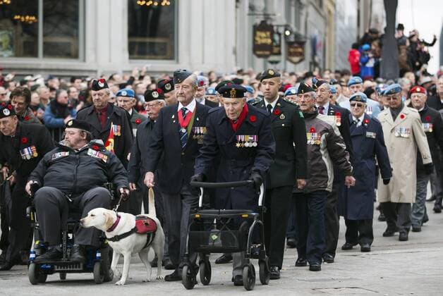 (151111) -- OTTAWA, Nov. 11, 2015 -- Veterans take part in Remembrance Day ceremonies at the National War Memorial in Ottawa, Canada, Nov. 11, 2015. ) CANADA-OTTAWA-REMEMBERANCE DAY ChrisxRoussakis 