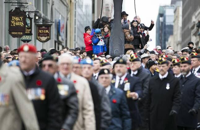 (151111) -- OTTAWA, Nov. 11, 2015 -- Veterans take part in Remembrance Day ceremonies at the National War Memorial in Ottawa, Canada, Nov. 11, 2015. ) CANADA-OTTAWA-REMEMBERANCE DAY ChrisxRoussakis 