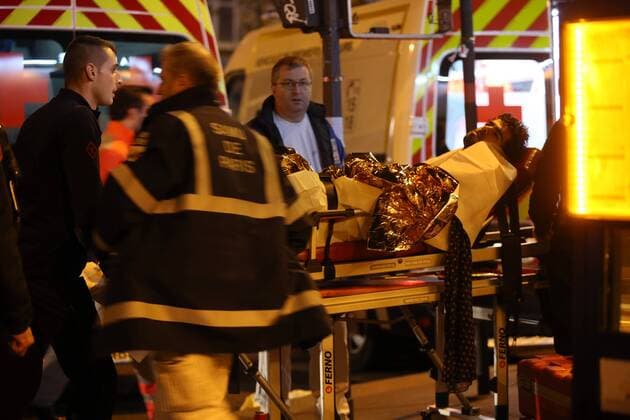 Nov. 14, 2015 - Paris, France - CORBIS OUT = Victims of the shooting at the Bataclan concert venue in central Paris are being evacuated to receive first aid. More than one hundred people were killed and many more wounded when gunmen opened fire inside the venue as the French capital has been the target of a series of deadly attacks. Paris France - ZUMAv111