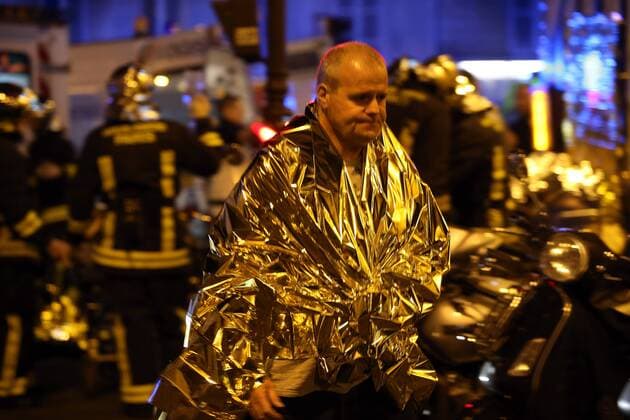 Nov. 14, 2015 - Paris, France - CORBIS OUT = Victims of the shooting at the Bataclan concert venue in central Paris are being evacuated to receive first aid. More than one hundred people were killed and many more wounded when gunmen opened fire inside the venue as the French capital has been the target of a series of deadly attacks. Paris France - ZUMAv111