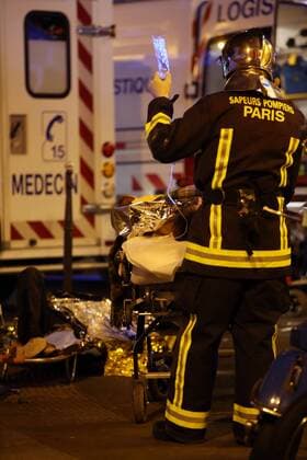 Nov. 14, 2015 - Paris, France - CORBIS OUT = Victims of the shooting at the Bataclan concert venue in central Paris are being evacuated to receive first aid. More than one hundred people were killed and many more wounded when gunmen opened fire inside the venue as the French capital has been the target of a series of deadly attacks. Paris France - ZUMAv111