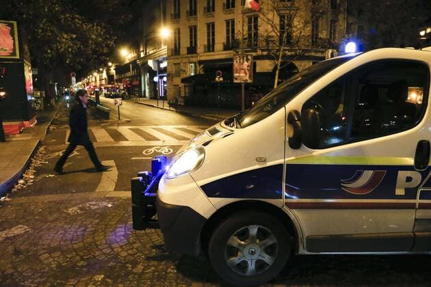 A police vehicle blocks a road leading to the Bataclan concert hall in Paris Nov. 14, 2015. Over 100 people were killed in a mass hostage-taking at the Bataclan concert hall Friday and many more were feared dead in a series of bombings and shootings. ) FRANCE-PARIS-ATTACK-BATACLAN CONCERT HALL ZhouxLei 