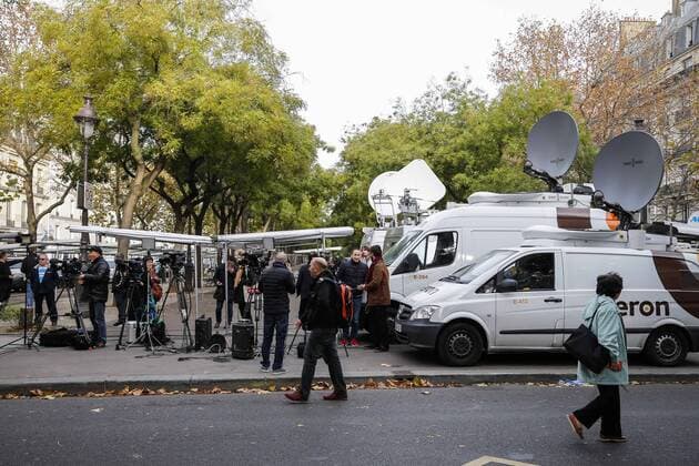 Journalists gather near the Bataclan concert hall in central Paris, France, Nov. 14, 2015. Over 100 people were killed in a mass hostage-taking at a Paris concert hall Friday and many more were feared dead in a series of bombings and shootings. ) FRANCE-PARIS-ATTACK-MEDIA ZhouxLei 