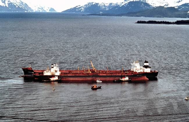 March 23, 1989 - Prince William Sound, AK, United States of America - Aerial view of the Exxon Valdez oil tanker after running aground on Bligh Reef in Prince William Sound spilling at least 11 million gallons of crude oil in the pristine waters March 23, 1989 in Prince William Sound, Alaska. Prince William Sound United States of America - ZUMAp138