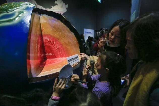 CHONGQING -- People visit the new Chongqing Museum of Natural History in Chongqing, southwest China, Nov. 15, 2015. The new Chongqing Museum of Natural History, the second largest natural museum in China, reopened on Nov. 9, 2015. ) (zwx) CHINA-CHONGQING-MUSEUM OF NATURAL HISTORY-REOPENING(CN) QinxTingfu 