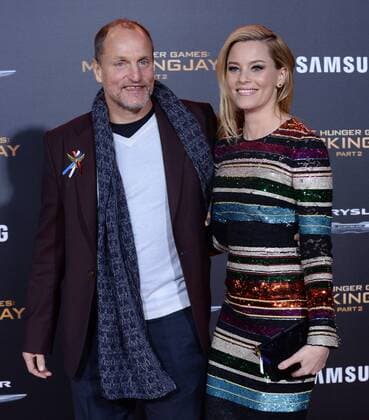 Cast members Woody Harrelson and Elizabeth Banks attend the premiere of the sci-fi motion picture The Hunger Games: Mockingjay - Part 2 at Microsoft Theater in Los Angeles on November 16, 2015. Storyline: As the war of Panem escalates to the destruction of other districts by the Capitol, Katniss Everdeen, the reluctant leader of the rebellion, must bring together an army against President Snow, while all she holds dear hangs in the balance.  LAP2015111625 JIMxRUYMEN