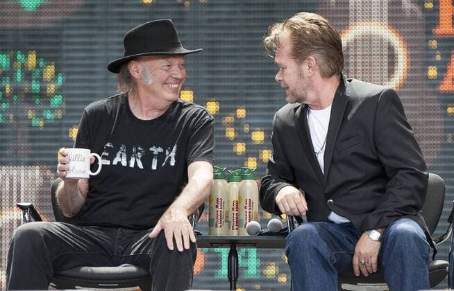 Sept. 13, 2014 - Raleigh, North Carolina; USA - Musician NEIL YOUNG and JOHN MELLANCAMP takes part in the press conference as part of the 29th Annual Farm Aid benefit concert that took place to a sold out audience at the Time Warner Cable Music Pavilion. Copyright 2014 Jason Moore. - ZUMAm78
