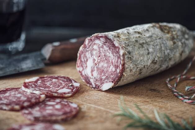 Sliced salami on cutting board  IPF000266