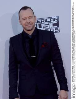 Actor Donnie Wahlberg arrives for the 43rd annual American Music Awards held at Microsoft Theater in Los Angeles on November 22, 2015.  LAP20151122137 JIMxRUYMEN