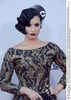 Recording artist Demi Lovato arrives for the 43rd annual American Music Awards held at Microsoft Theater in Los Angeles on November 22, 2015.  LAP20151122145 JIMxRUYMEN