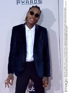 Recording artist Wiz Khalifa arrives for the 43rd annual American Music Awards held at Microsoft Theater in Los Angeles on November 22, 2015.  LAP20151122189 JIMxRUYMEN