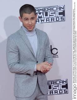 Singer Nick Jonas arrives for the 43rd annual American Music Awards held at Microsoft Theater in Los Angeles on November 22, 2015.  LAP20151122197 JIMxRUYMEN