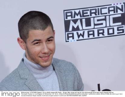 Singer Nick Jonas arrives for the 43rd annual American Music Awards held at Microsoft Theater in Los Angeles on November 22, 2015.  LAP20151122198 JIMxRUYMEN