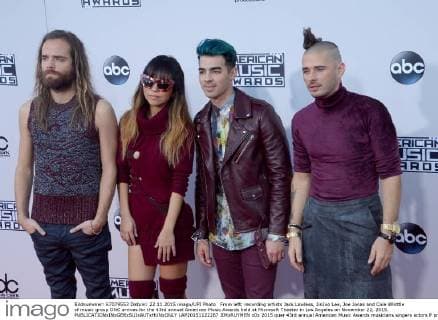 From left, recording artists Jack Lawless, JinJoo Lee, Joe Jonas and Cole Whittle of music group DNC arrives for the 43rd annual American Music Awards held at Microsoft Theater in Los Angeles on November 22, 2015.  LAP20151122267 JIMxRUYMEN