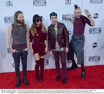 From left, recording artists Jack Lawless, JinJoo Lee, Joe Jonas and Cole Whittle of music group DNC arrives for the 43rd annual American Music Awards held at Microsoft Theater in Los Angeles on November 22, 2015.  LAP20151122272 JIMxRUYMEN
