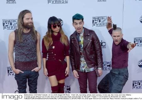 From left, recording artists Jack Lawless, JinJoo Lee, Joe Jonas and Cole Whittle of music group DNC arrives for the 43rd annual American Music Awards held at Microsoft Theater in Los Angeles on November 22, 2015.  LAP20151122273 JIMxRUYMEN
