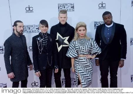 From left, singers Avi Kaplan, Mitch Grassi, Scott Hoying, Kirstin Maldonado and Kevin Olusola of Pentatonix arrive for the 43rd annual American Music Awards held at Microsoft Theater in Los Angeles on November 22, 2015.  LAP20151122290 JIMxRUYMEN