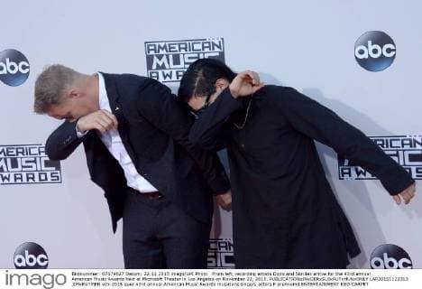 From left, recording artists Diplo and Skrillex arrive for the 43rd annual American Music Awards held at Microsoft Theater in Los Angeles on November 22, 2015.  LAP20151122313 JIMxRUYMEN